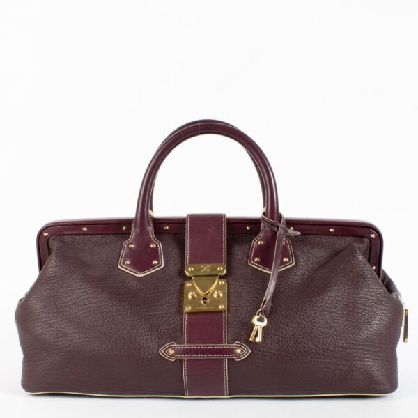 authentic preloved Louis Vuitton Purple Souhali L'ingénieux GM Top Handle on Labellov.com