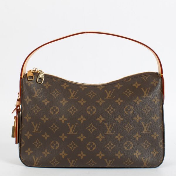 Shop the authentic Louis Vuitton Monogram Slouchy PM Bag second hand on Labellov.com.