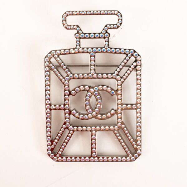 Authentic pre-loved Chanel Crystal Perfume Bottle CC Brooch Ruthenium Iridescent Blue on Labellov.com