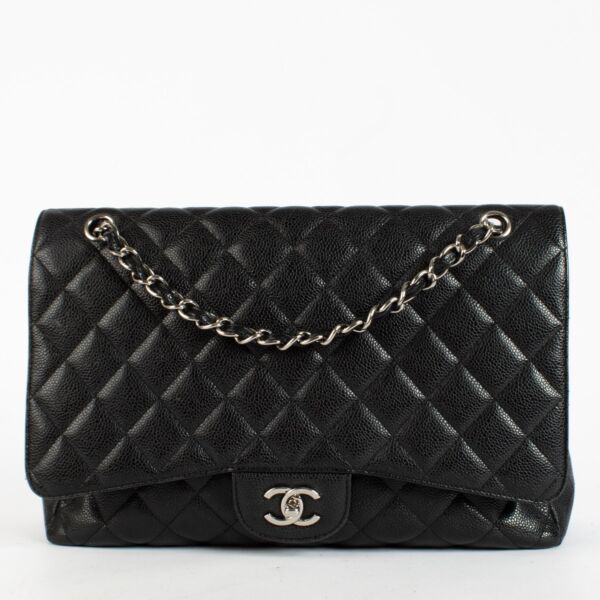 authentic preloved Chanel Maxi Classic Flap Black Caviar SHW on Labellov.com