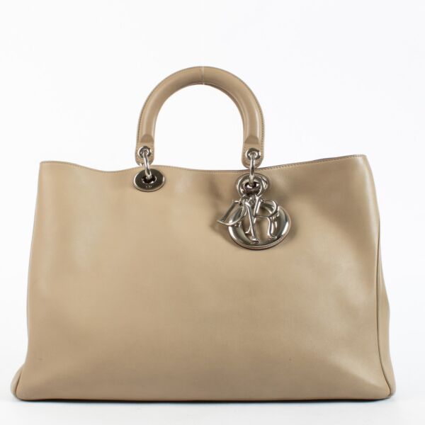 Dior Diorissimo Large beige calfskin top handle bag with silver-tone hardware, removable pouch and shoulder strap at Labellov.com