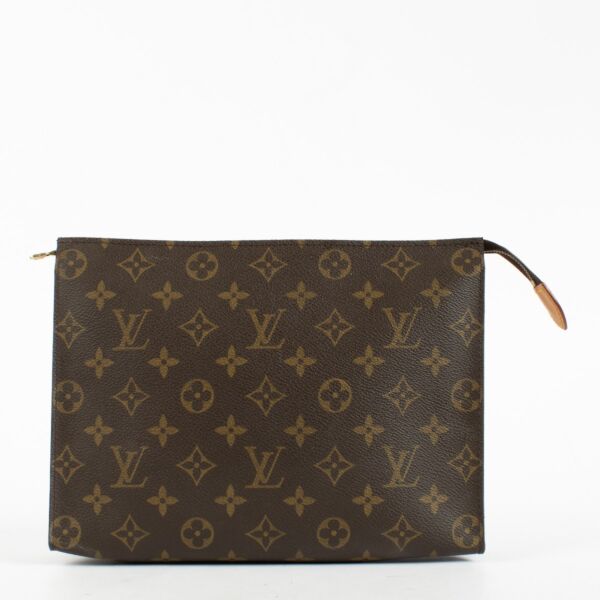 Louis Vuitton Monogram Toiletry Pouch in brown coated canvas with leather trim at Labellov.com