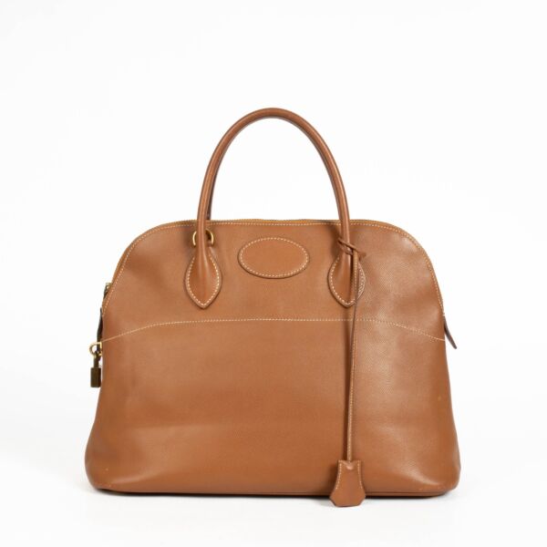 Shop the authentic pre-loved Hermès Bolide 35 Gold Courchevel GHW on Labellov.com 