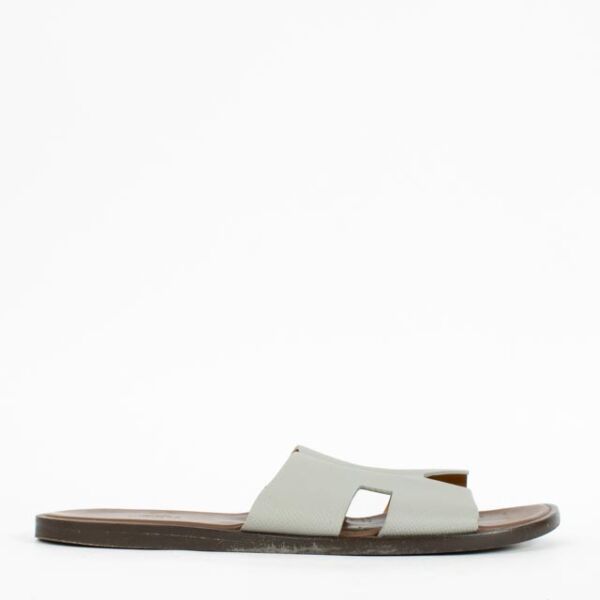 Shop the authentic Hermès Grey Izmir Sandals Size 44 second hand on Labellov.com.