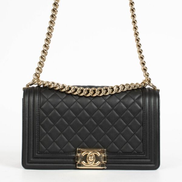 Authentic pre-loved Chanel Black Lambskin Medium Boy Shoulder Bag on Labellov.com
