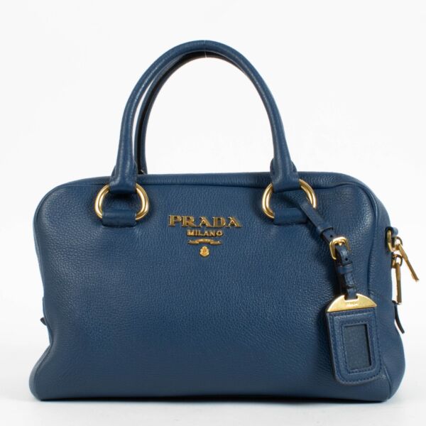 Authentic pre-loved Prada Blue Mini Vitello Phenix Bauletto Bag on Labellov.com