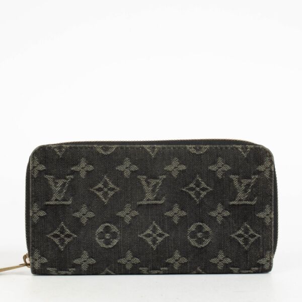 Authentic pre-loved Louis Vuitton Black Monogram Denim Zippy Wallet on Labellov.com