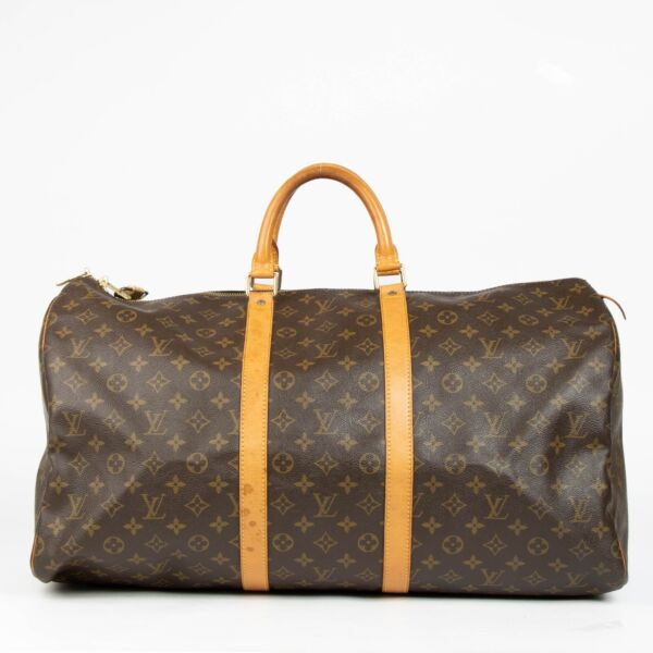 Authentic pre-loved Louis Vuitton Damier Ebene Keepall 55 on Labellov.com