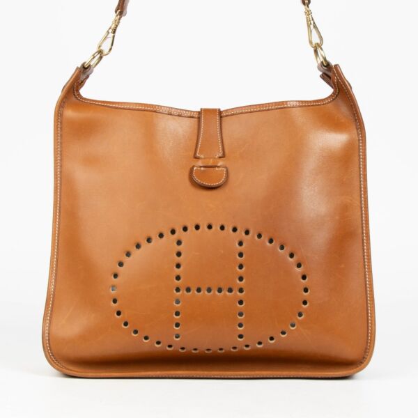 Shop this authentic Hermès Evelyne 33 Fauve Barenia GHW Crossbody pre-loved on Labellov.com 