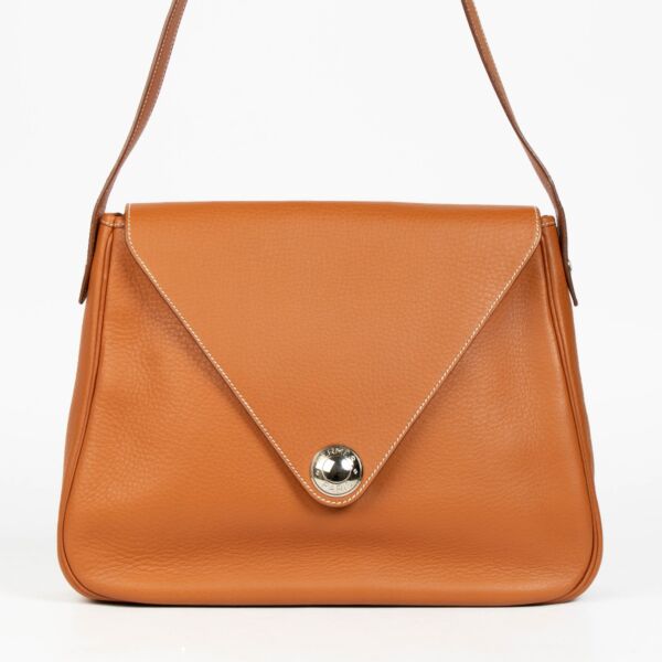 100% authentic second hand Hermès Gold Fjord Leather Large Christine Envelope Bag at Labellov.