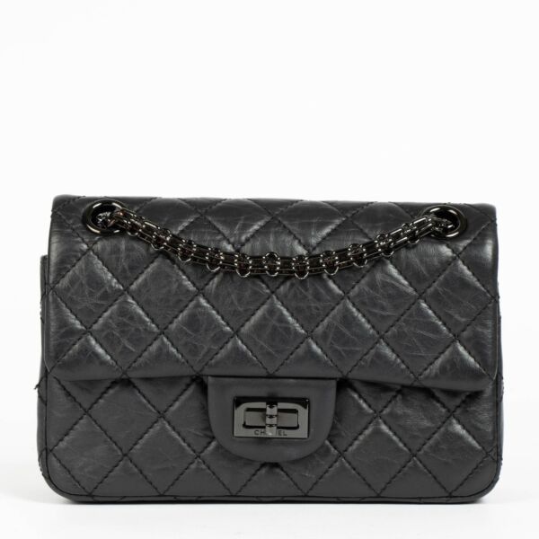 Authentic pre-loved Chanel So Black Calfskin Mini 2.55 Reissue Bag on Labellov.com