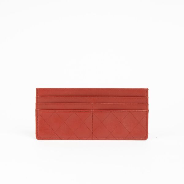 Authentic pre-loved Chanel Vintage Red Quilted Leather Card Holder on Labellov.com