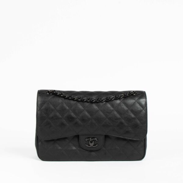 Shop this 100% authentic Chanel Black Crumpled Calfskin Large/Jumbo Classic Flap Bag at Labellov.com
