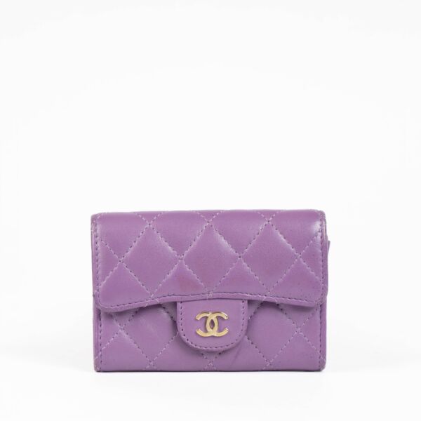 Authentic pre-loved Chanel Purple Quilted Lambskin Flap Card Holder on Labellov.com