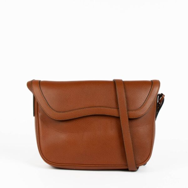 Shop this authentic Delvaux Tan Crossbody Flap Bag  pre-loved on Labellov.com 