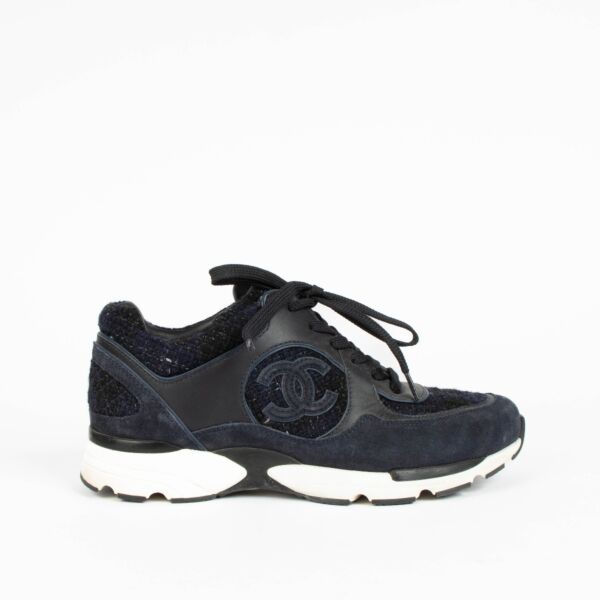 Shop this 100% authentic Chanel Blue Tweed Sneakers in size 39 at Labellov.com