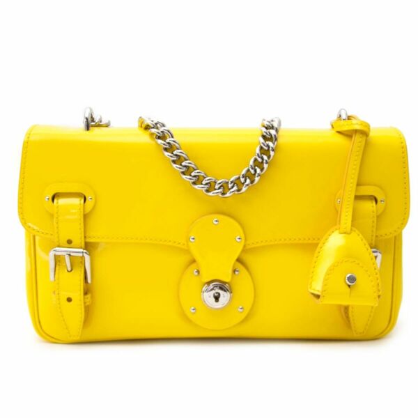 Buy authentic secondhand Ralph Lauren Yellow Patent bag at the right price at LabelLOV vintage webshop. Safe and secure online shopping