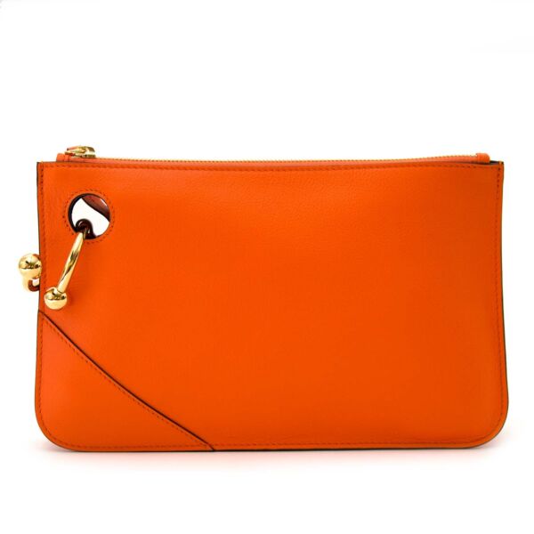 Buy authentic jw anderson tangerine pierce clutch at labellov vintage fashion webshop belgium