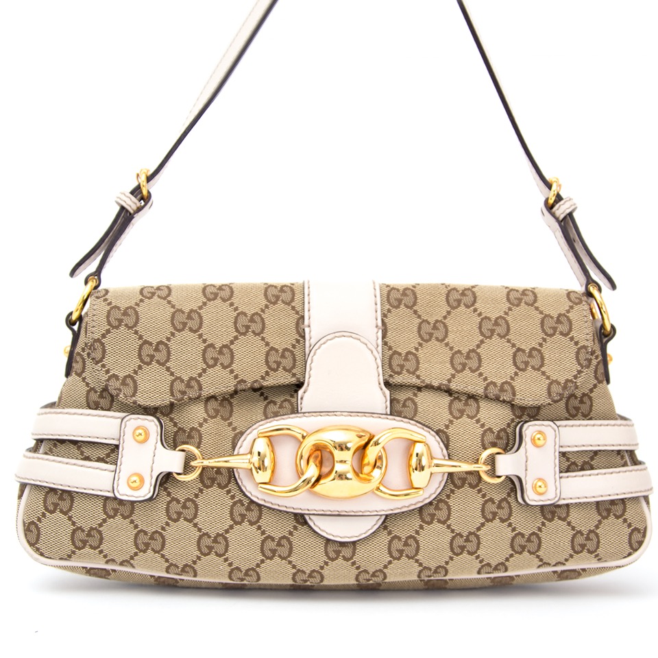 beige gucci purse