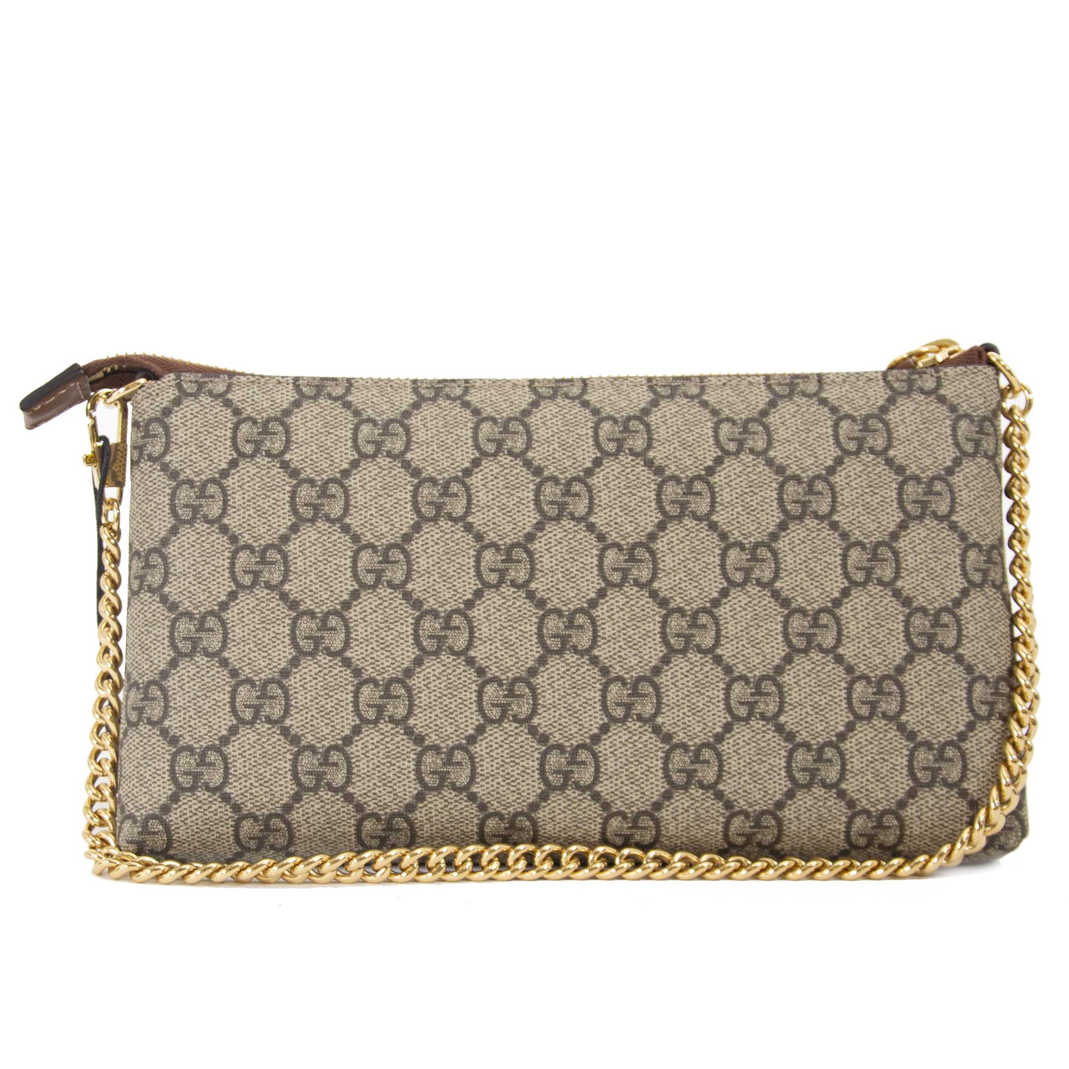 Wrist wallet hot sale gucci