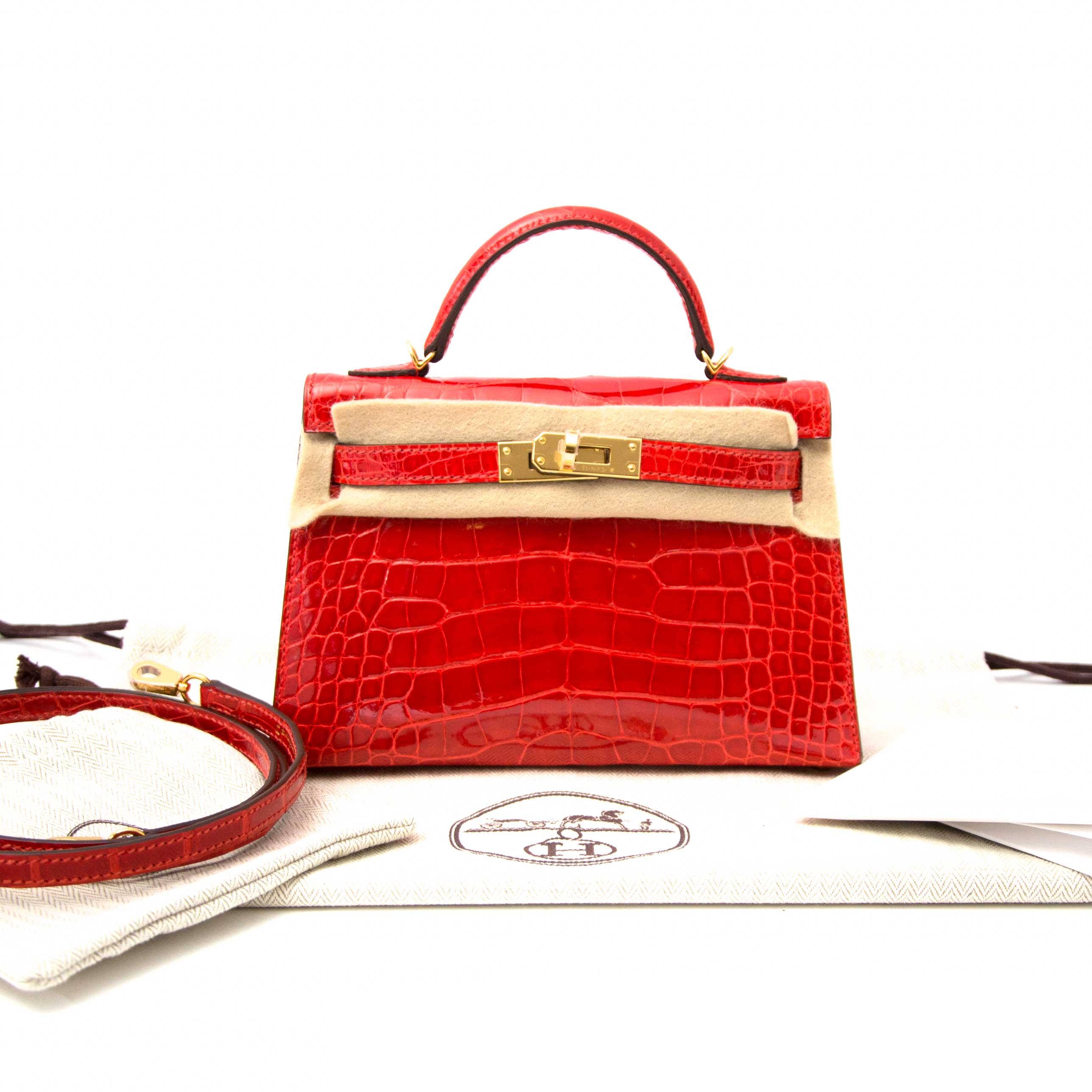 Hermès Rose Extreme Mini Kelly Pochette of Shiny Mississippiensis