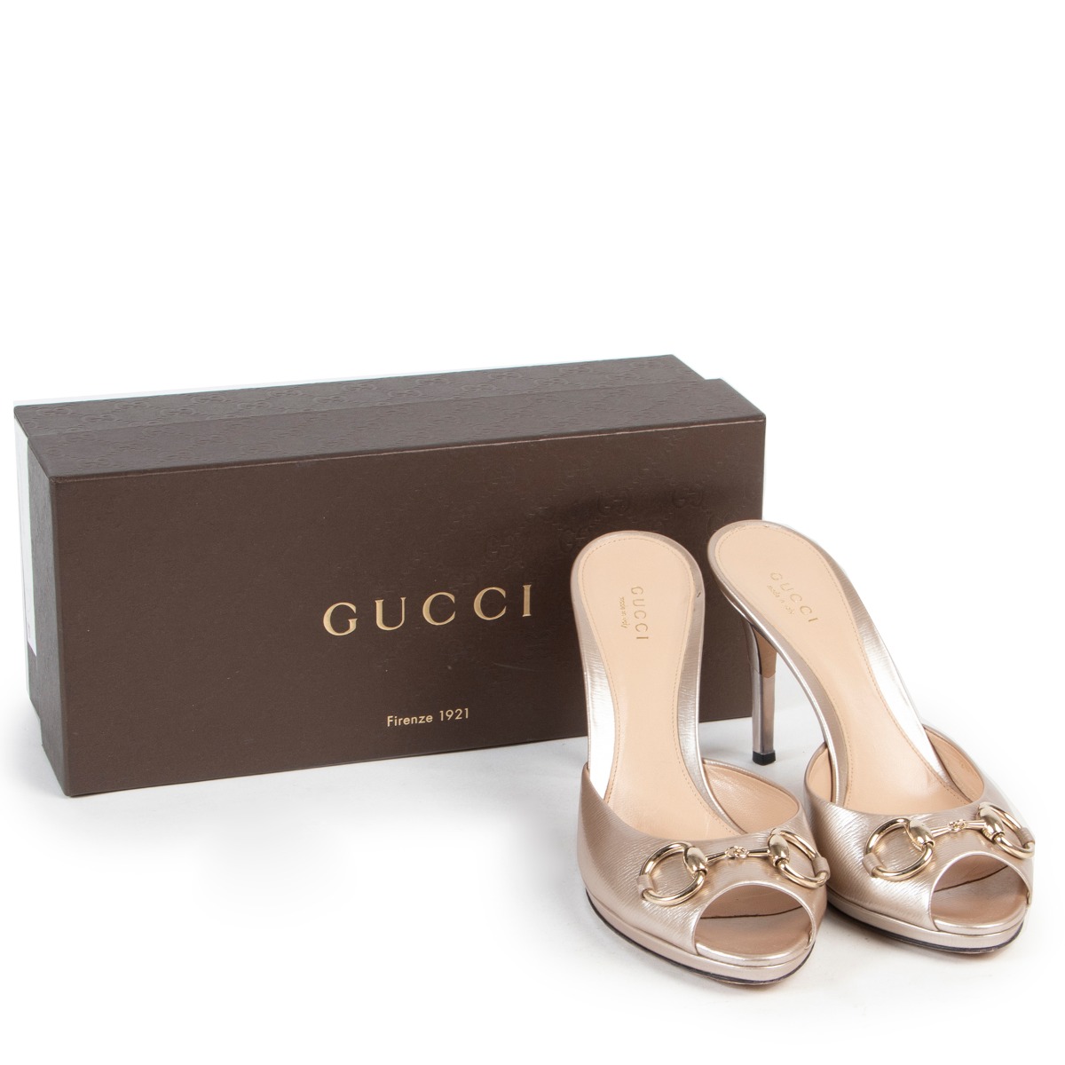 ll00908_gucci_silver_mules.jpg