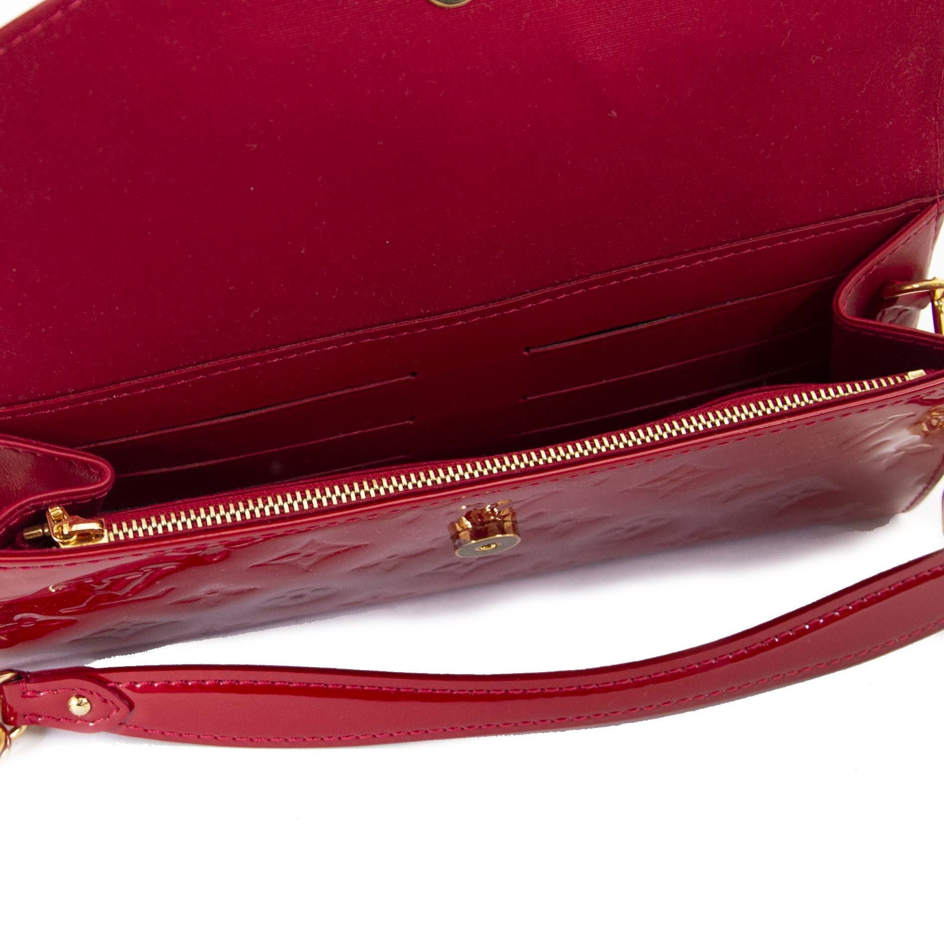 Sunset boulevard patent leather clutch bag Louis Vuitton Brown in Patent  leather - 12584343
