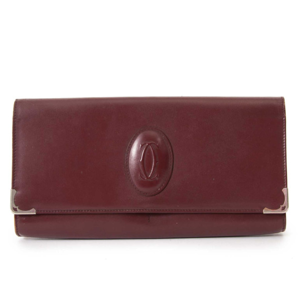 Cartier Burgundy Leather Clutch Bag Labellov Buy and Sell Authentic Luxury