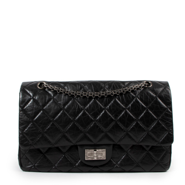 ll06642_chanel_black_leather_c